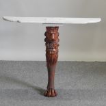 A marble top console table, with carved figural support,