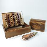 A George III inlaid dome top tea caddy, together with a walnut cased solitaire,