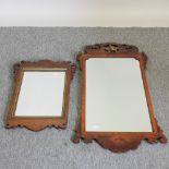 An early 20th century fret carved wall mirror, 93 x 50cm,