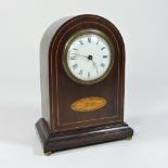 An Edwardian mahogany and inlaid mantel clock,