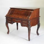 An early 20th century French rosewood bureau, with an s shaped hinged fall,