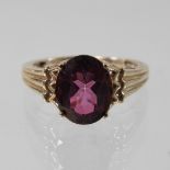 A 9 carat gold topaz single stone ring, boxed,