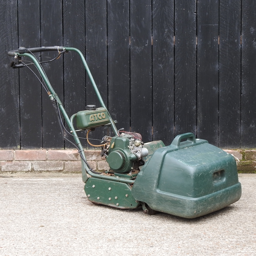 An Atco Commodore B17 petrol cylinder lawnmower,