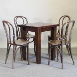 A set of four Thonet style bentwood dining chairs, together with a square dining table,