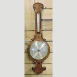 A 19th century walnut cased wheel barometer,