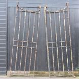 A pair of large antique wrought iron gates,