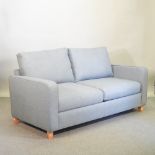 A John Lewis blue upholstered sofa bed,