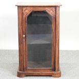 A Victorian walnut and inlaid music cabinet,