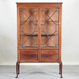 An Edwardian mahogany and inlaid display cabinet,
