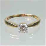 A 14 carat gold solitaire diamond ring, approximately 0.5 carats, size Q, 2.6g gross.