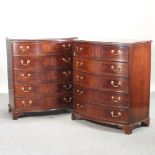 A pair of reproduction bow front chests,