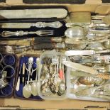 A collection of silver plated cutlery,