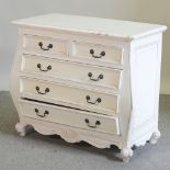 A modern French style white painted bombe chest of drawers,