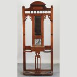 A Victorian walnut mirror back hall stand,