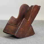 A 17th century style elm child's lambing chair,