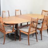 A 1960's G Plan teak extending dining table, 208 x 105cm overall,