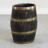 A 19th century coopered oak barrel stick stand,
