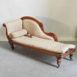 A Victorian upholstered chaise longue,