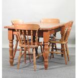 A modern pine dining table, 137 x 91cm,