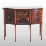 A George III mahogany and inlaid bow front sideboard, of small proportions,