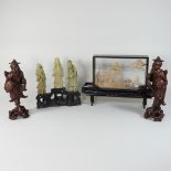 An Oriental carved hardstone figure group,
