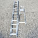 An aluminium two part extending ladder, each 300cm,