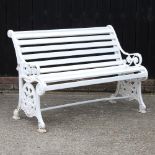 An early 20th century painted cast iron garden bench, of thistle and rose design, 131cm, together
