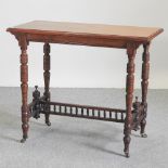 An Edwardian walnut centre table, on ring turned legs, 89 x 43cm,