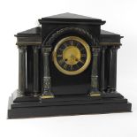 A Victorian black slate mantel clock,