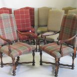 A set of ten oak and upholstered high back dining chairs,