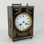 A 19th century French ebonised and gilt metal mounted mantel clock,