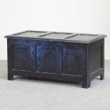 A black painted oak blanket box,