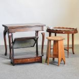 An early 20th century fold over tea table, 76cm, together with a swing frame toiletry mirror,