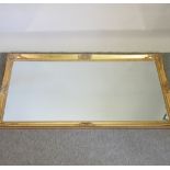 A gilt framed wall mirror,