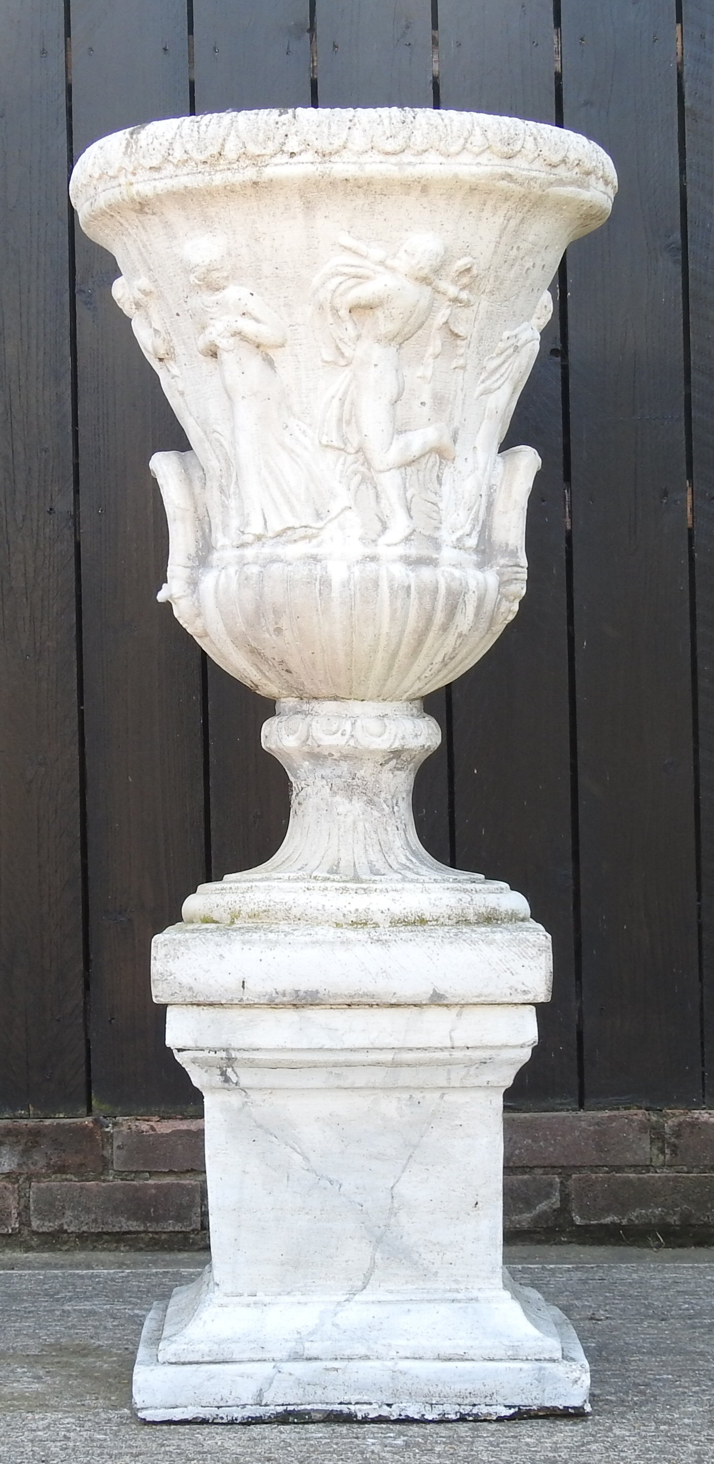 A weathered reconstituted stone faux marble garden urn, on a pedestal base, - Image 6 of 13