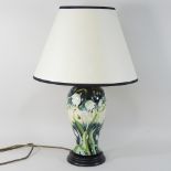 A modern Moorcroft pottery table lamp and shade,