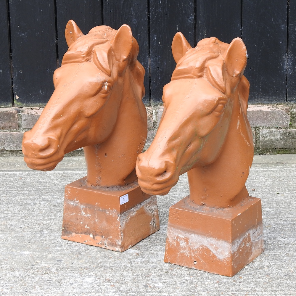 A pair of powder coated cast iron gatepost finials, each in the form of a horse's head,