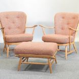 A pair of Ercol light elm armchairs, with loose cushions,