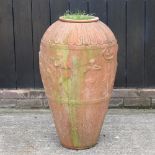A classical style terracotta garden urn,