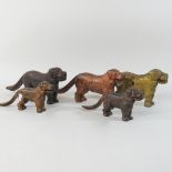 A collection of five 19th century cast iron novelty nut crackers, each in the form of a dog,
