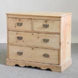 An antique pine chest of drawers,