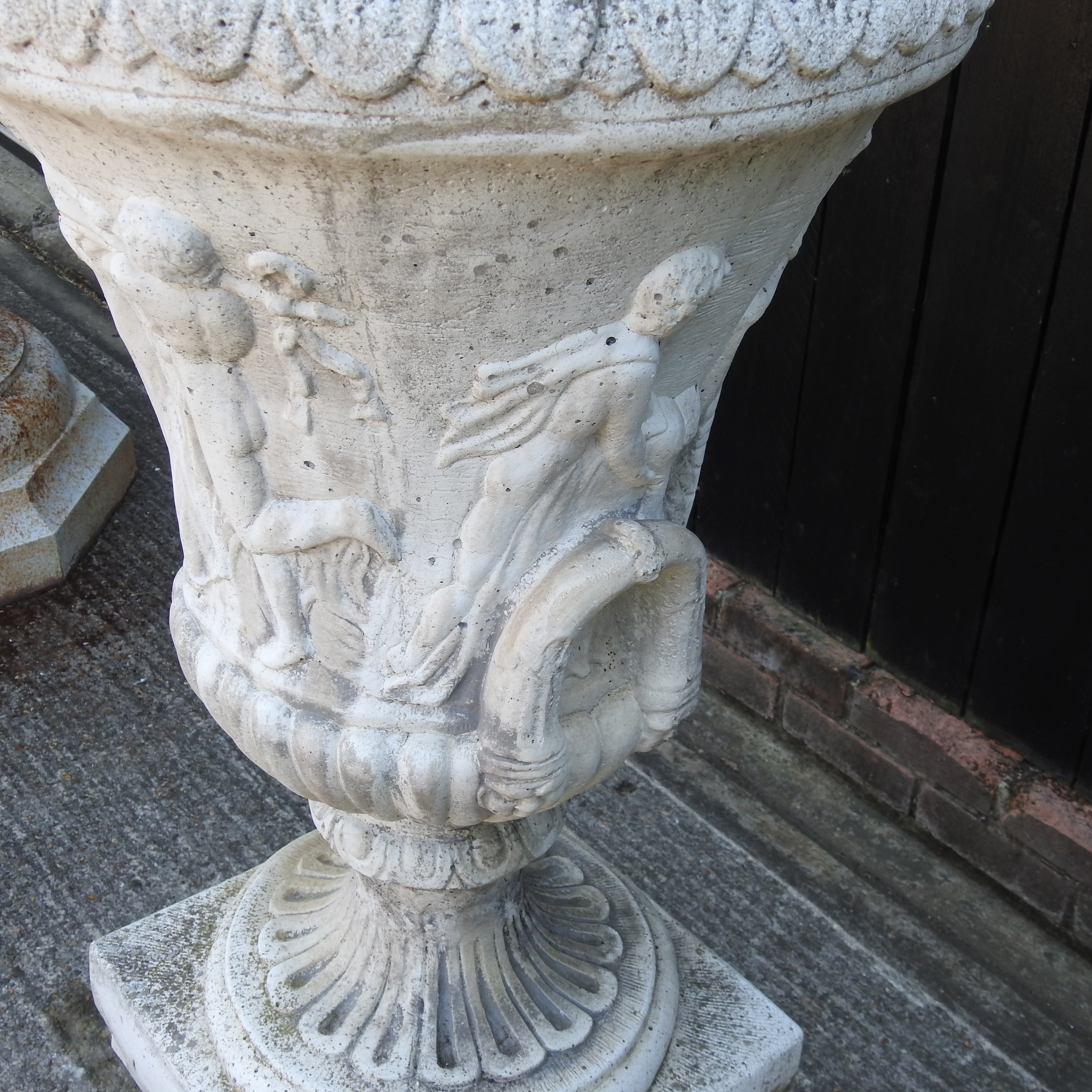 A weathered reconstituted stone faux marble garden urn, on a pedestal base, - Image 8 of 13