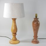 An elm table lamp, together with another similar,