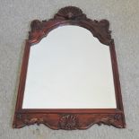 A 19th century style mahogany wall mirror,