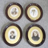 A set of four vintage portrait prints, in oval frames,