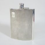 An Asprey silver hip flask, with engine turned decoration, Birmingham 1990, 328g, 17cm high,