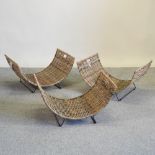 A set of three metal framed wicker log baskets,