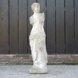 A reconstituted stone garden figure of a classical lady,