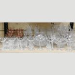 A collection of glassware to include cut glass wine glasses and cut glass tumblers