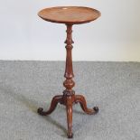 A Victorian fruitwood tripod table,